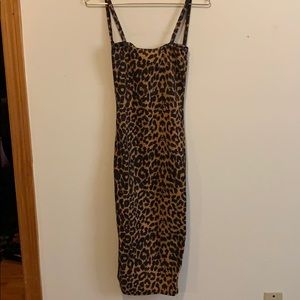 Cheetah print body con midi dress